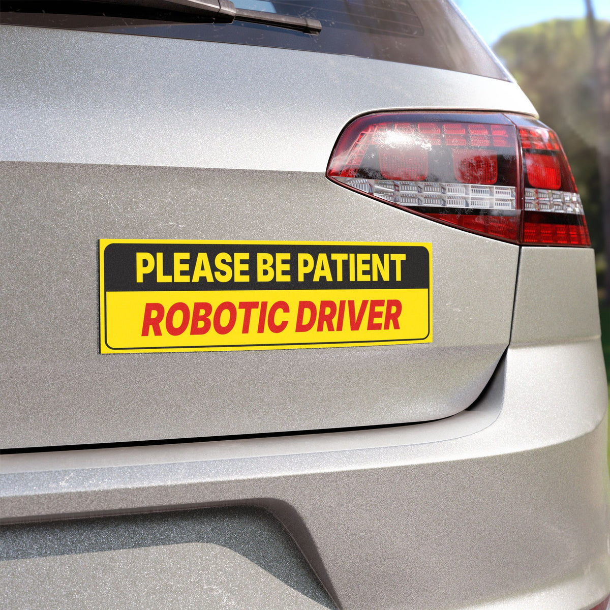 Bumper magnet reading Please Be Patient, alternate view
