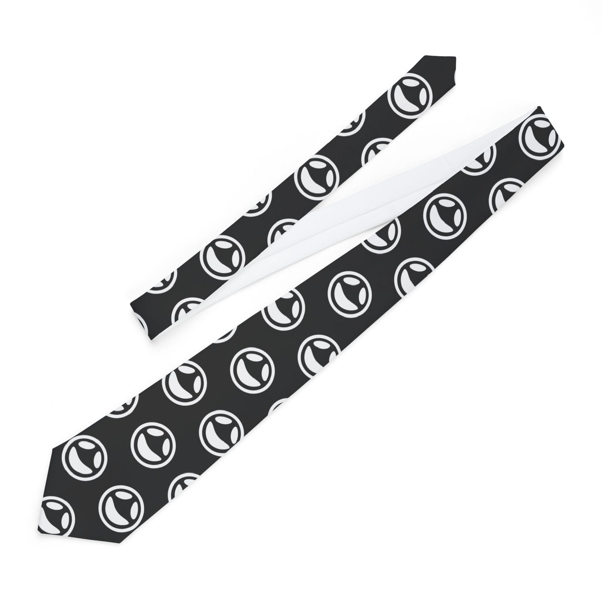 Slim black necktie with repeating small smiley dot pattern